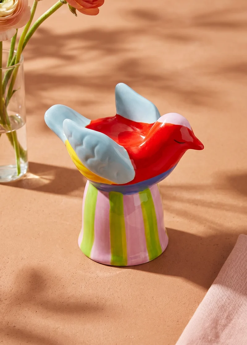 Ceramic bird tealight holder with striped base