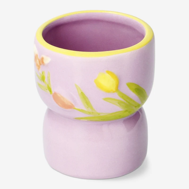 Tealight holder with embossed flowers