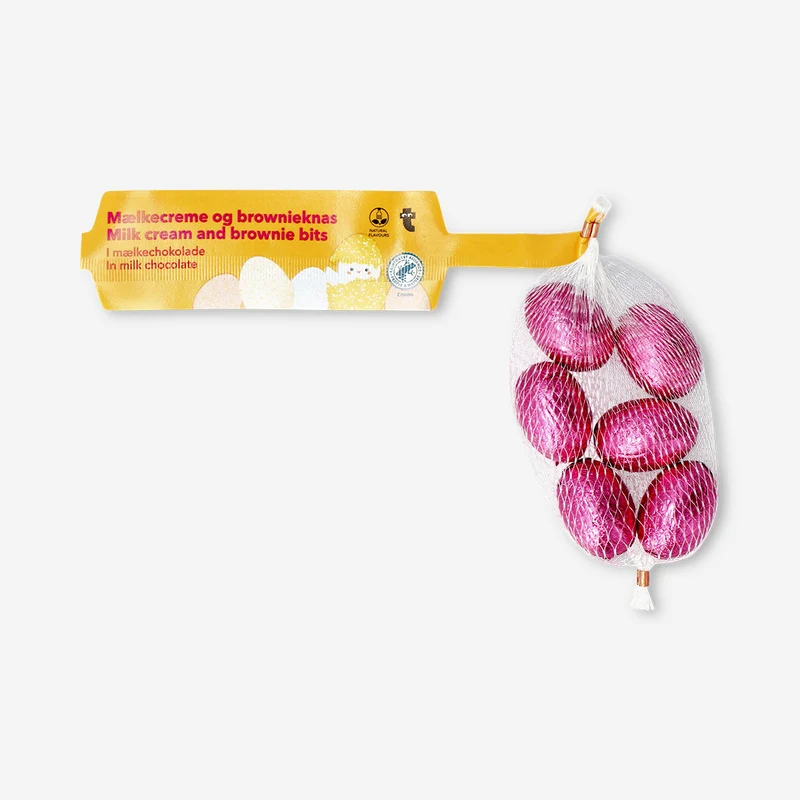 Pink milk chocolate eggs in net with milky cream filling and brownie