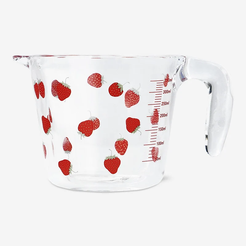Measuring cup with strawberry print